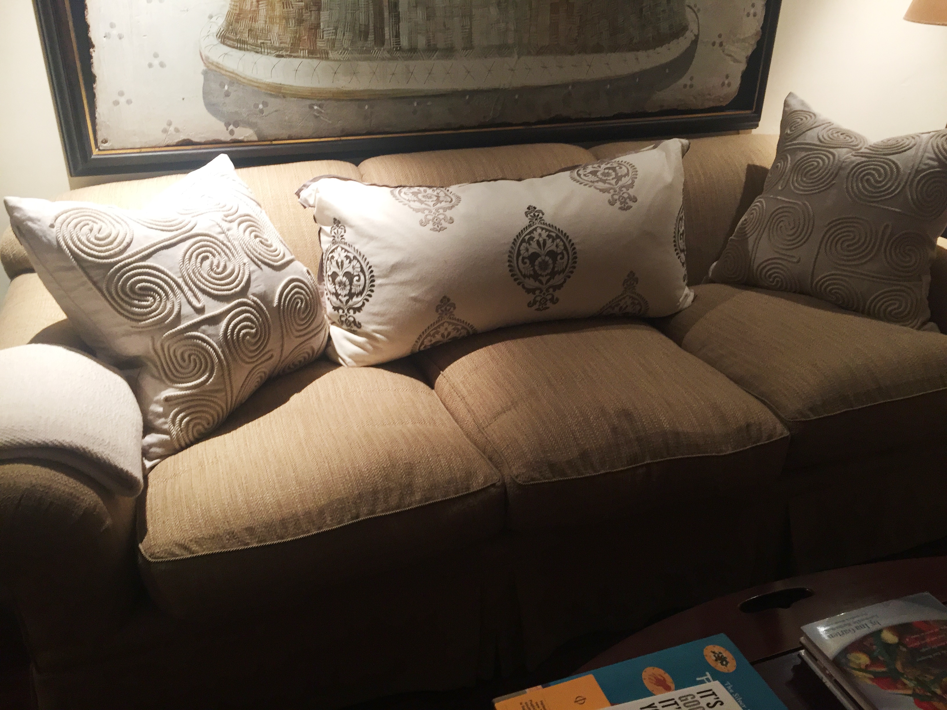 Circle pillow on sofa corrected